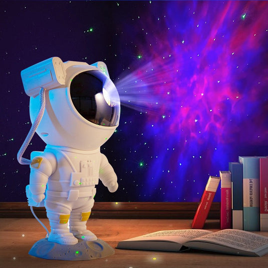 Veilleuse astronaute avec une étoile projecteur LED de ciel étoilé noir •  Veilleuse